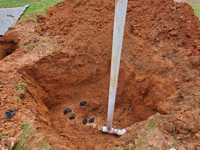 Inspect and repair any leaks or cracks in the septic tank or pipes to prevent groundwater contamination.